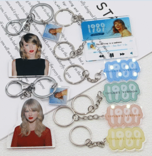 A multicoloured acrylic keychain with Taylor Swift 1989 design.