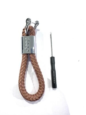 Black woven car logo key holder Australia with Jeep logo on a car key.