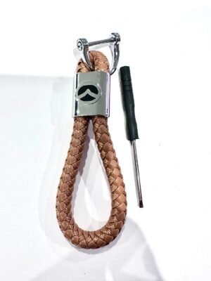 Black car styling metal leather keychain for Mazda Australia with Mazda logo on a car key.
