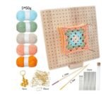 A beige wooden crochet board with pins and needles.