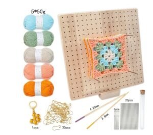 A beige wooden crochet board with pins and needles.