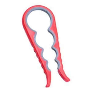 Red easy grip jar opener with multiple ring sizes on a kitchen counter.
